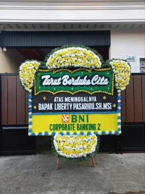 Papan Bunga Duka di Air Batu