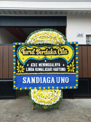 Papan Bunga Duka di Air Batu