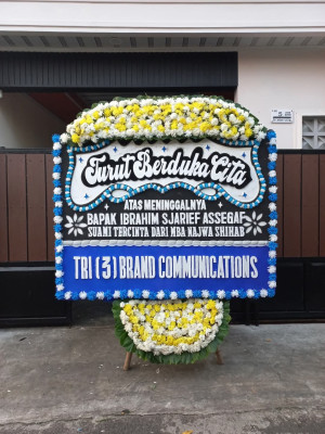 Papan Bunga Duka di Air Batu
